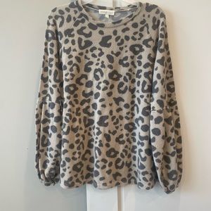Women’s long sleeve poly/raylon cheetah print shirt
